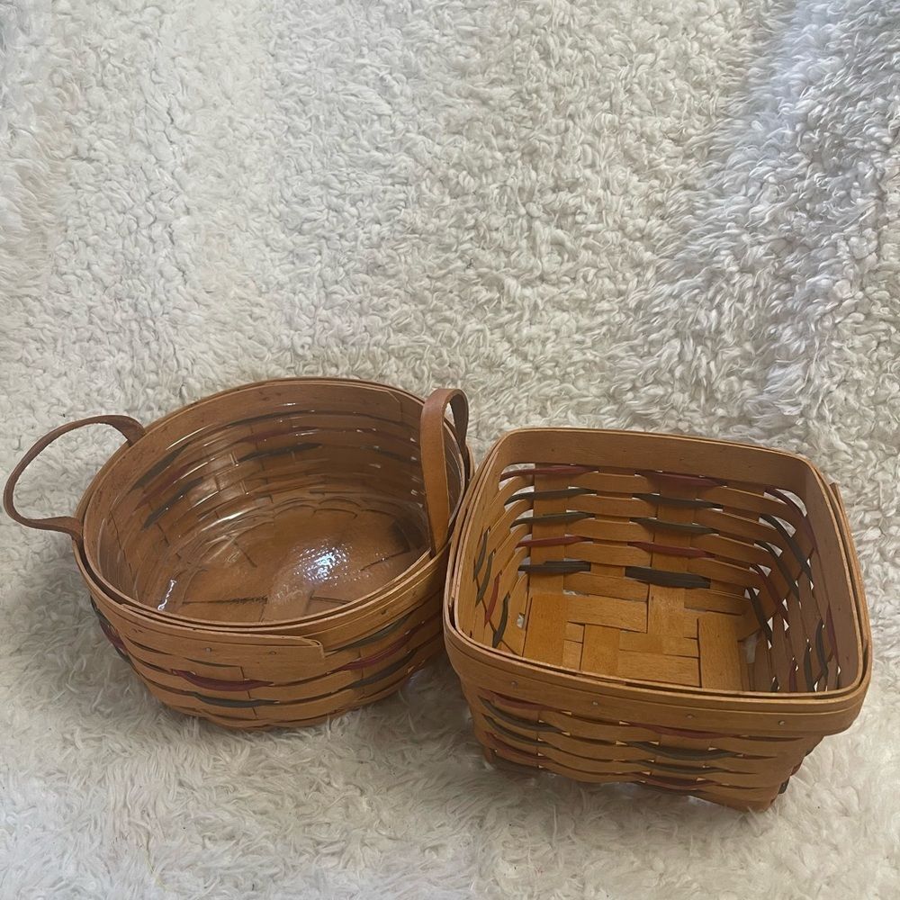 Longaberger 1995 set of two Handcrafted round and Square Woven baskets .